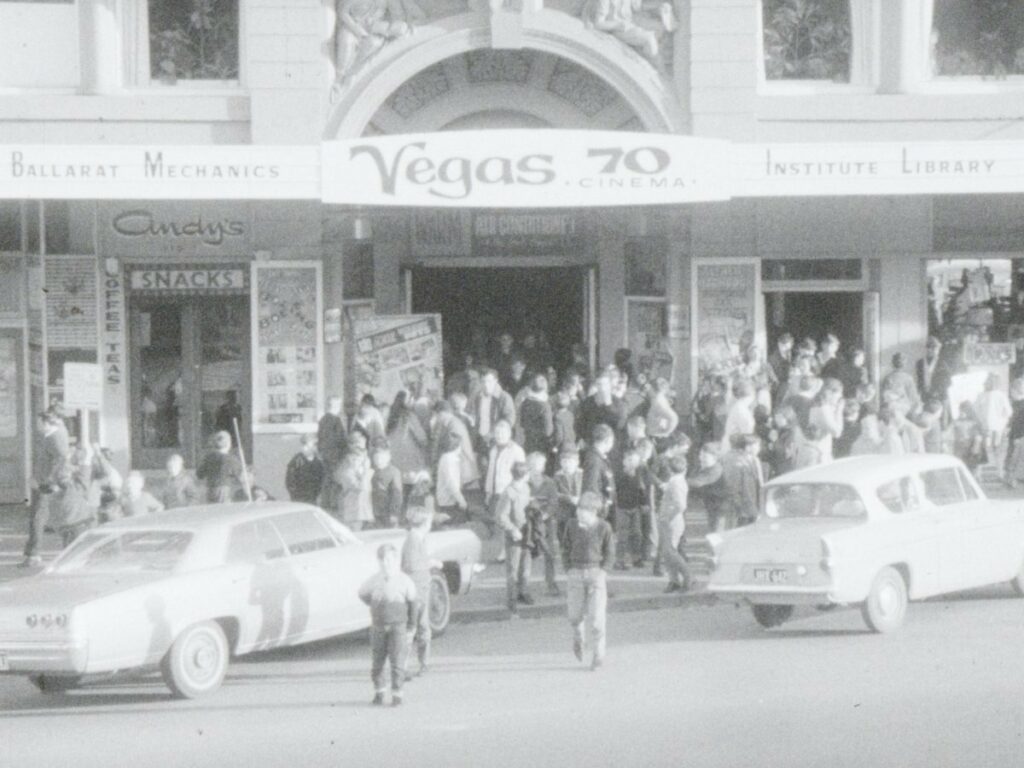 Heritage photo of people gathering outside the BMI